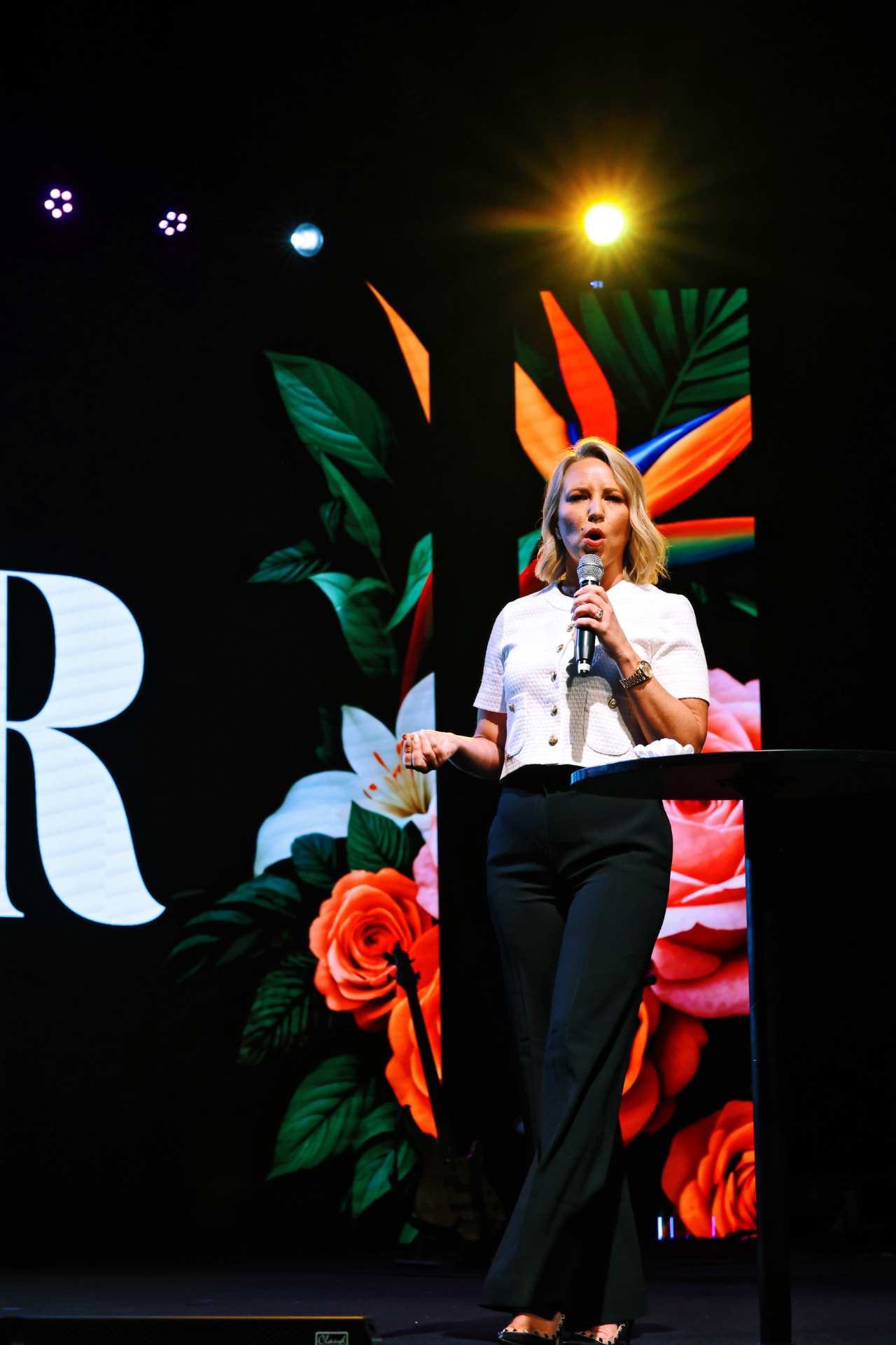 Tara Oldridge speaking on stage